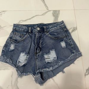 ripped jean shorts with back and front pockets